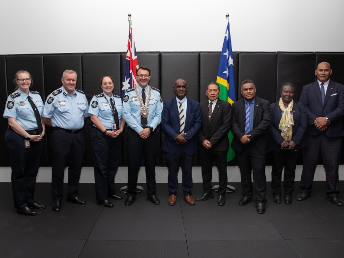 AFP Commissioner and Solomon Islands PM with delegation at training centre