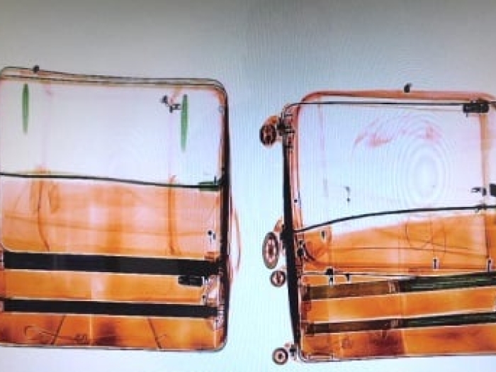 X-rays were used to discover approximately 6kg of cocaine allegedly concealed in the baggage of two Brazilian nationals.